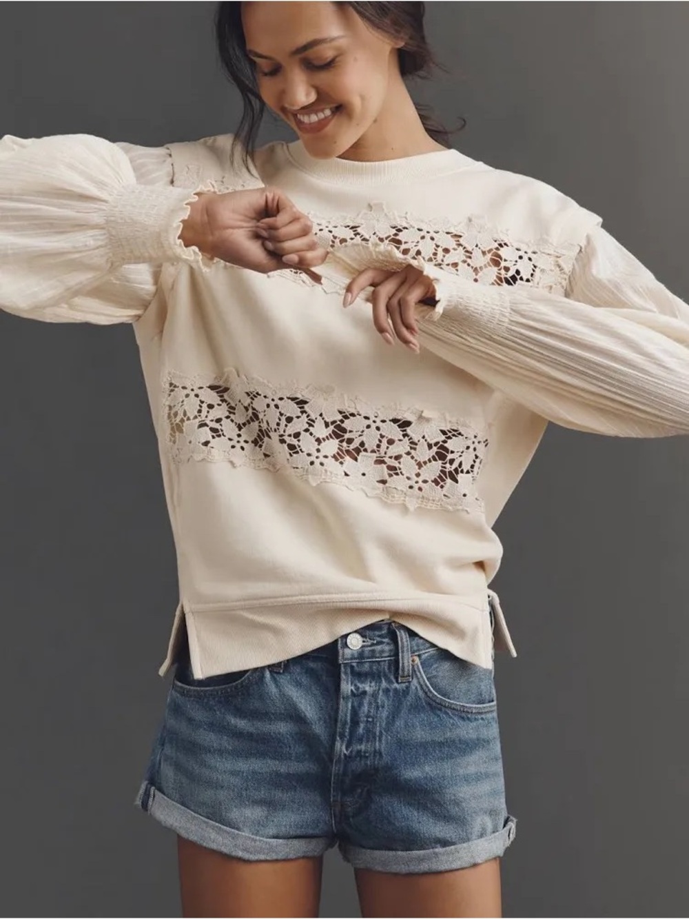Floral cutwork long sleeve top by Anthropologie
